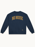 NO NOISE Collegiate Heavyweight Crewneck — Navy, front view showing arched antique-gold NO NOISE lettering and small crown near hem.