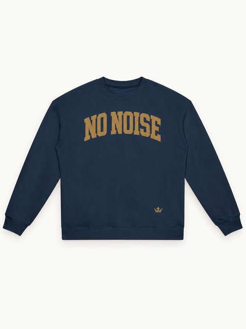 NO NOISE Collegiate Heavyweight Crewneck — Navy, front view showing arched antique-gold NO NOISE lettering and small crown near hem.