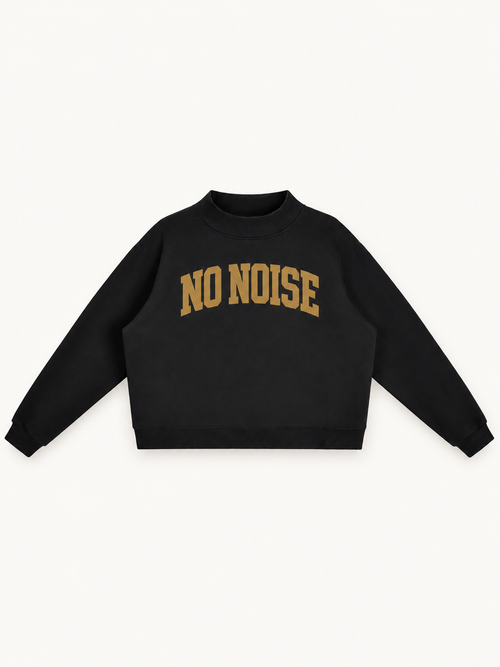 NO NOISE Essential Mock-Neck Sweatshirt — Onyx, front view showing antique-gold arched NO NOISE lettering and raised neckline.