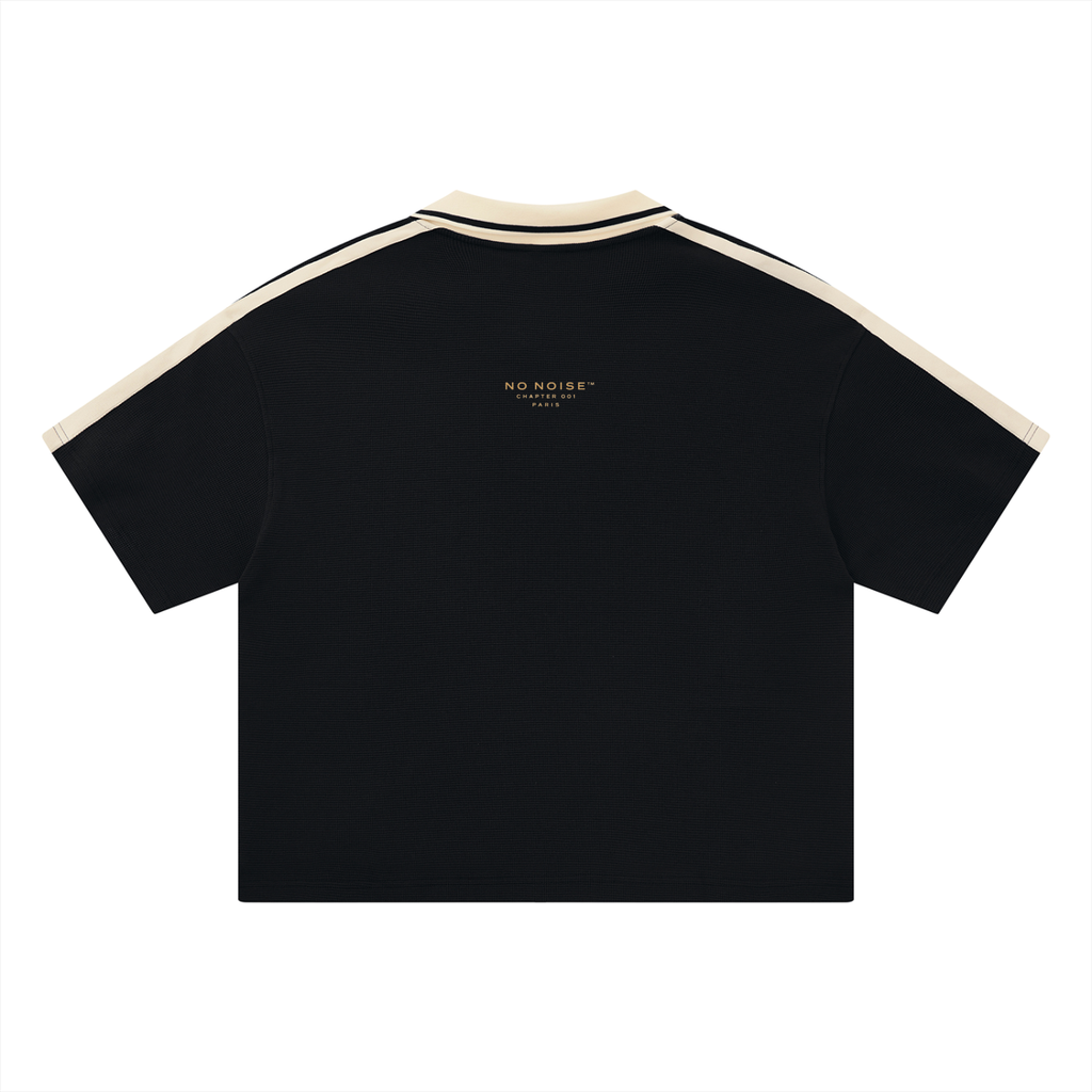 NO NOISE™ Chapter 001 Paris Unisex Color Block Polo Shirt — Black/Cream, back view