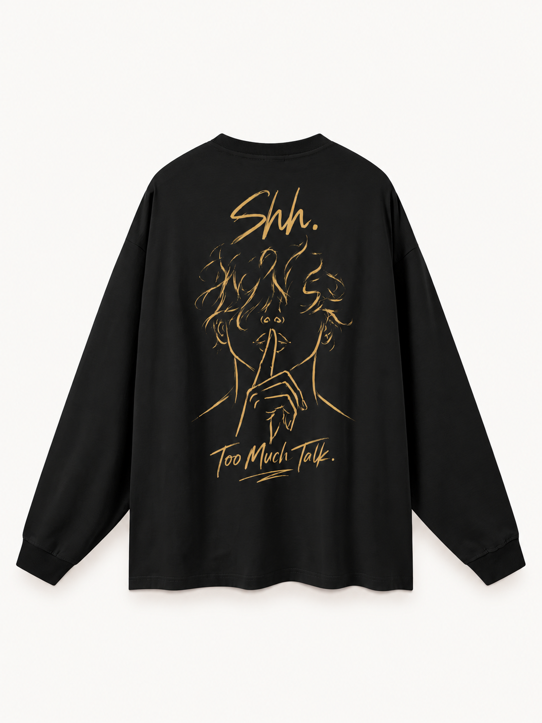 Quiet Signal long-sleeve T-shirt in Black, back view, showing a gold-tone finger-to-lips portrait graphic with Shh. and Too Much Talk. lettering.
