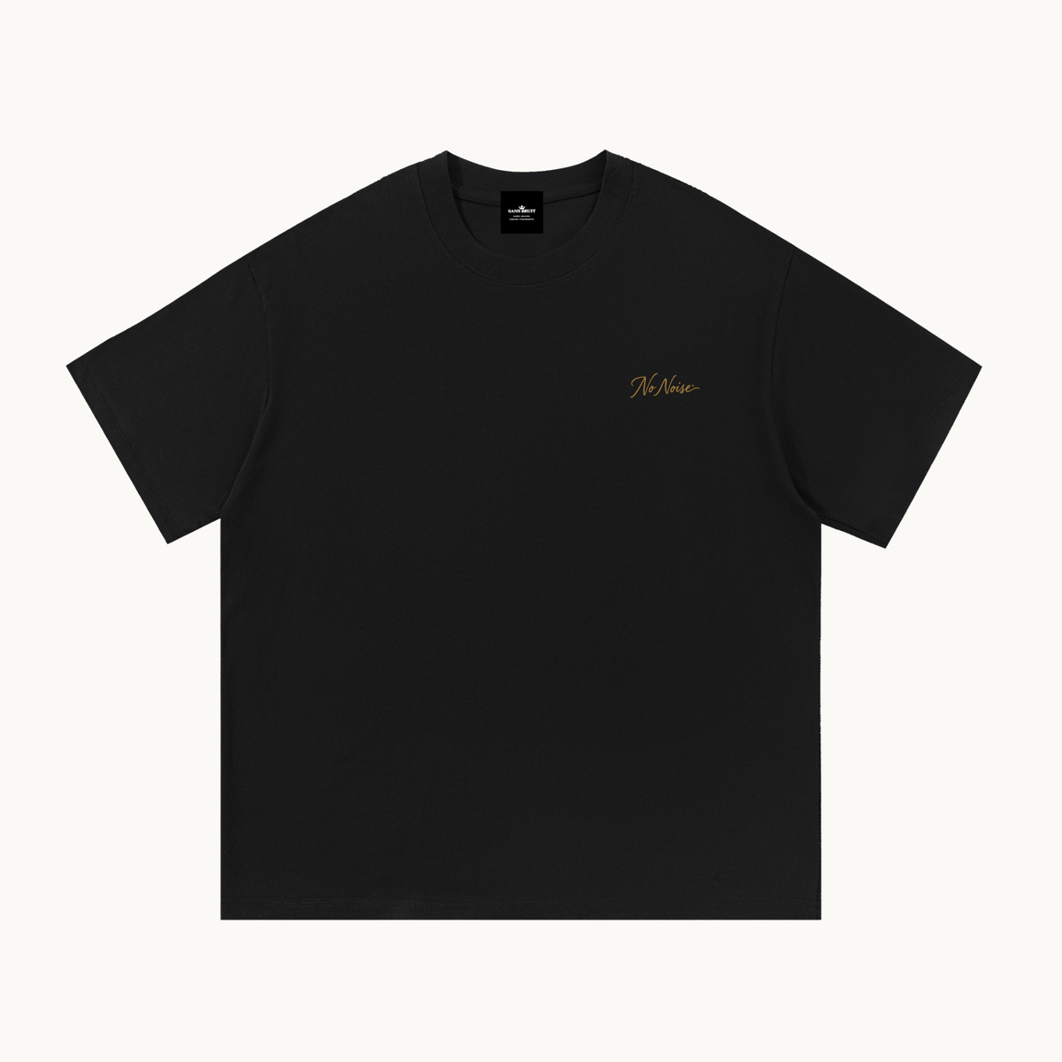 Essential Signature Tee in black, front view with small gold No Noise script at the left chest