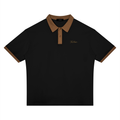 NO NOISE Silent Standard Contrast Polo, black with brown collar, two-button placket and sleeve trim, front view.
