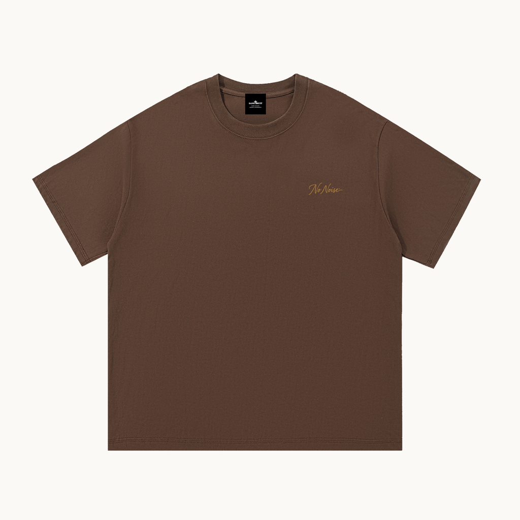 Essential Signature Tee in coffee brown, front view with small gold No Noise script at the left chest