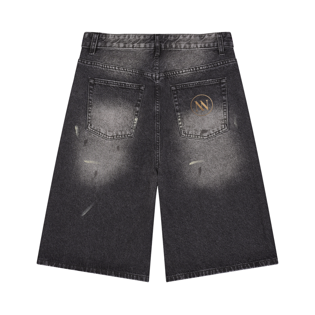 NO NOISE The Still Wide-Leg Denim Short — Faded Black, back view showing rear patch pockets and gold NN emblem.