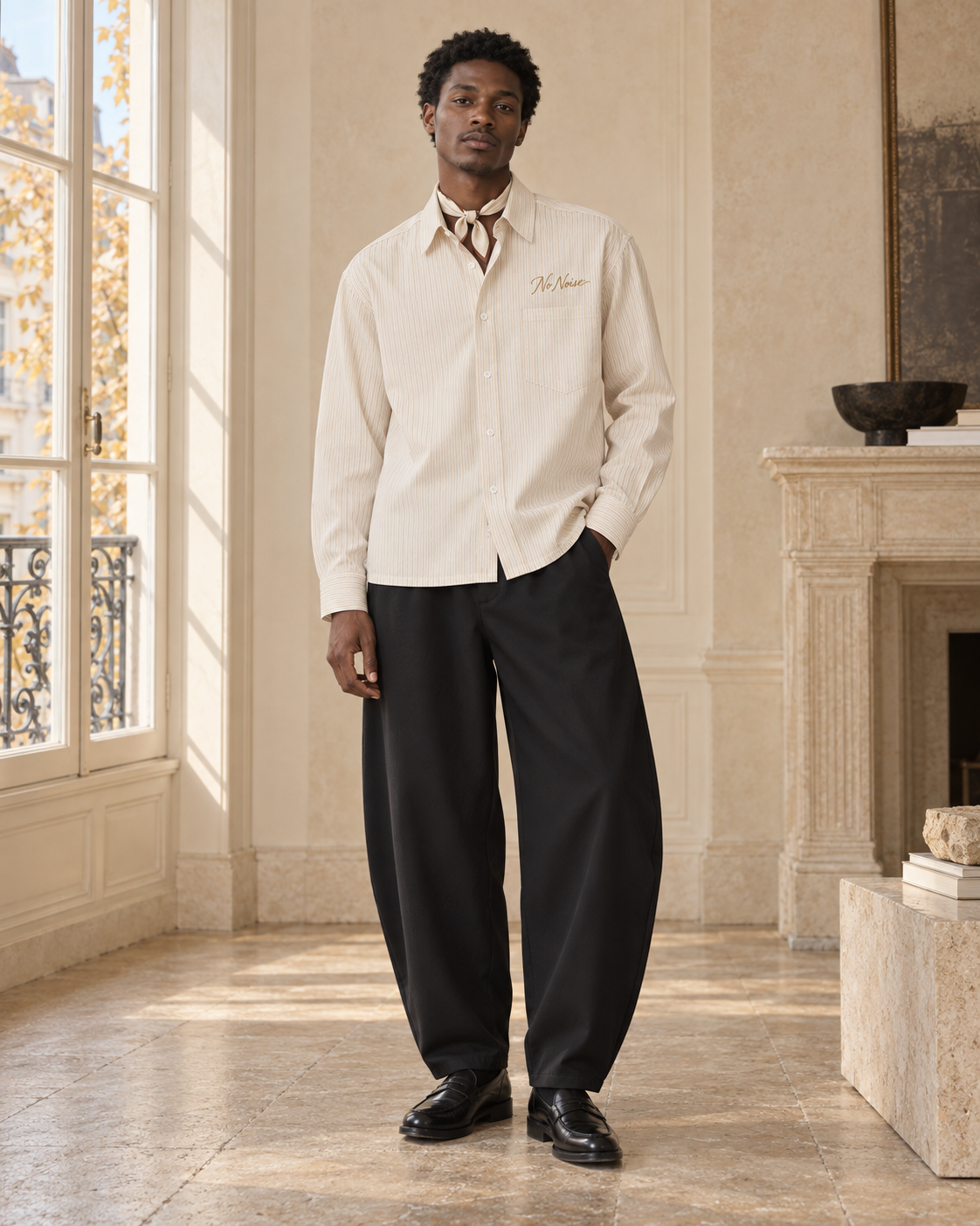 HIM Fall–Winter look: Sans Bruit Crown Shirt with black Still Form barrel trousers, ivory neck scarf and loafers.