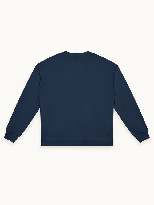 NO NOISE Collegiate Heavyweight Crewneck — Navy, back view showing plain navy fabric and ribbed hem.