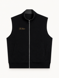 NO NOISE Essential Zip Vest — Charcoal, front view showing stand collar, zipper, pockets and gold chest script.