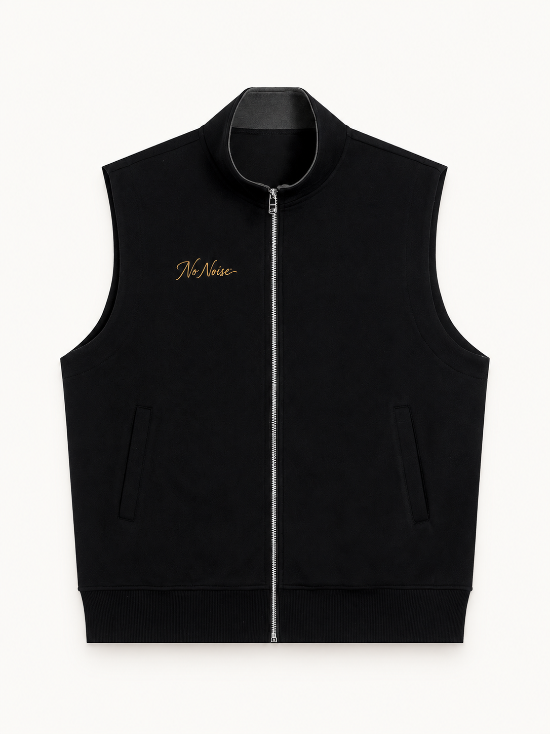 NO NOISE Essential Zip Vest — Charcoal, front view showing stand collar, zipper, pockets and gold chest script.