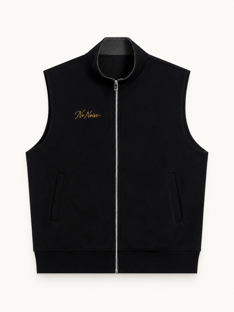 NO NOISE Essential Zip Vest — Charcoal, front view showing stand collar, zipper, pockets and gold chest script.