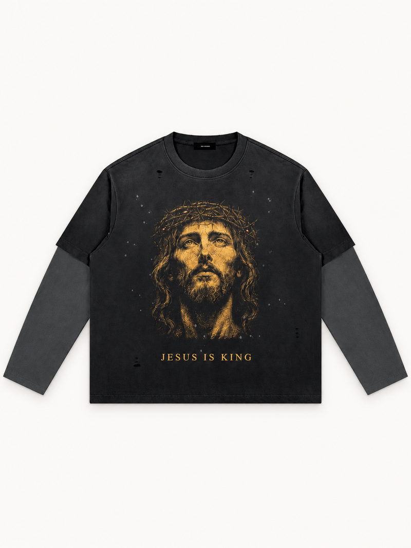 Front of the black layered NO NOISE™ long sleeve, ARTICLE 010, with graphite under-sleeves and an antique gold crown of thorns portrait above JESUS IS KING.
