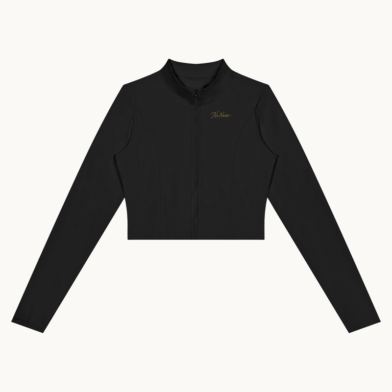 Form Cropped Jacket — Onyx, black, front view showing stand collar, zipper and curved panel seams. On warm ivory.
