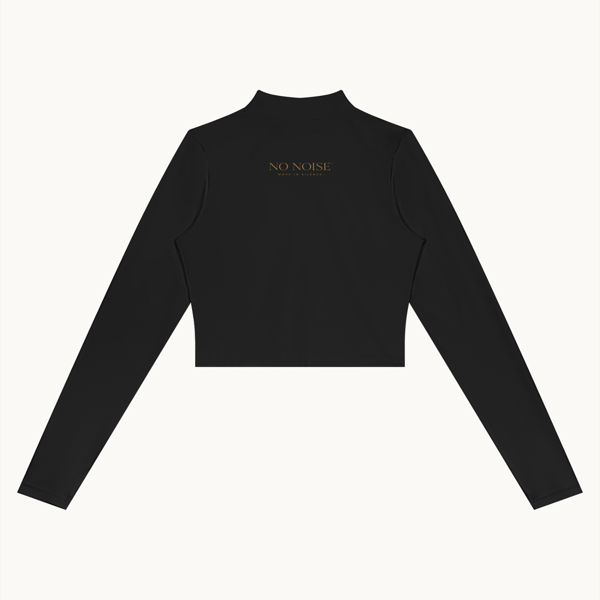 Form Cropped Jacket — Onyx, black, back view showing cropped hem and small gold lettering. On warm ivory.