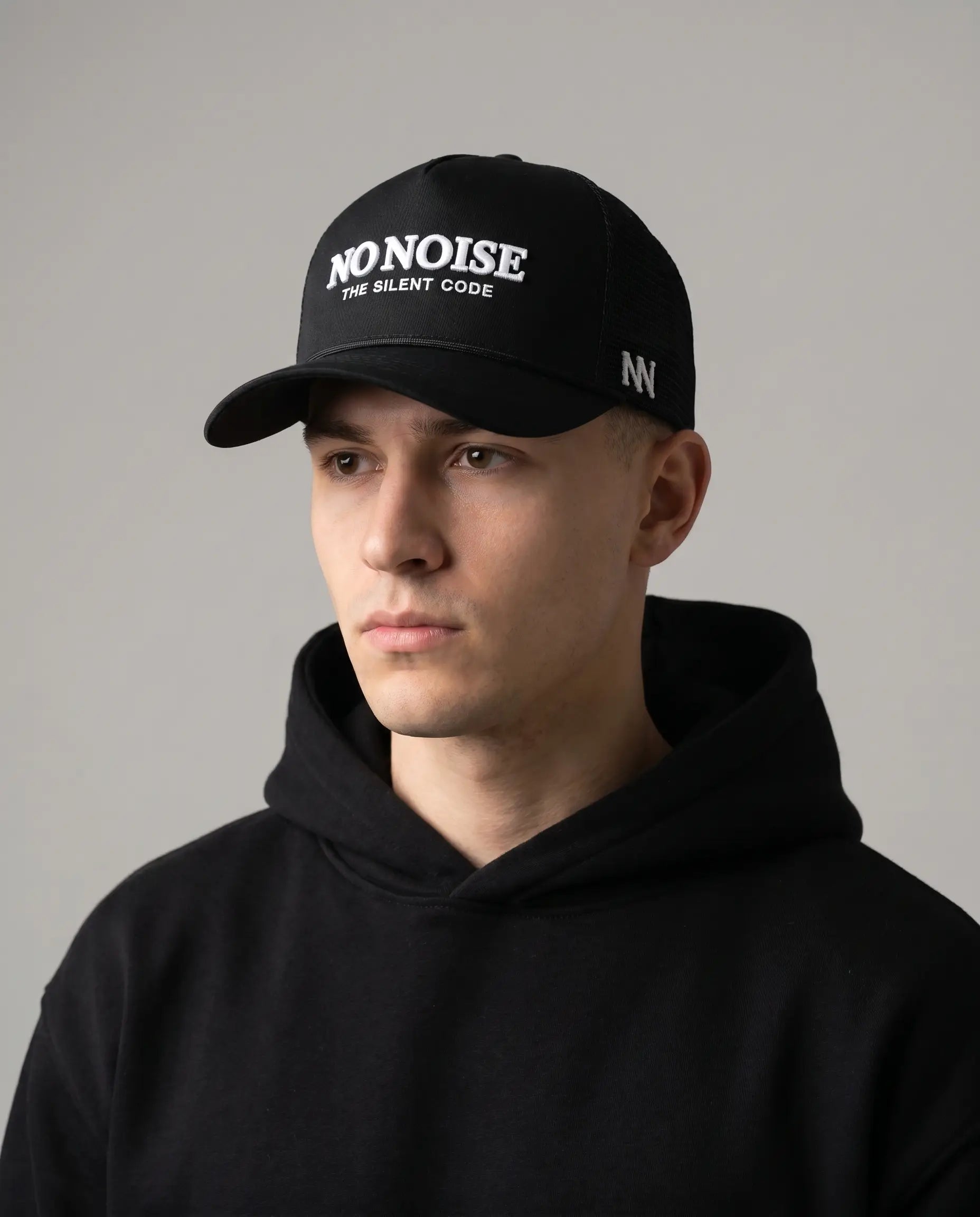 NO NOISE Shadow Code hat on model, front view