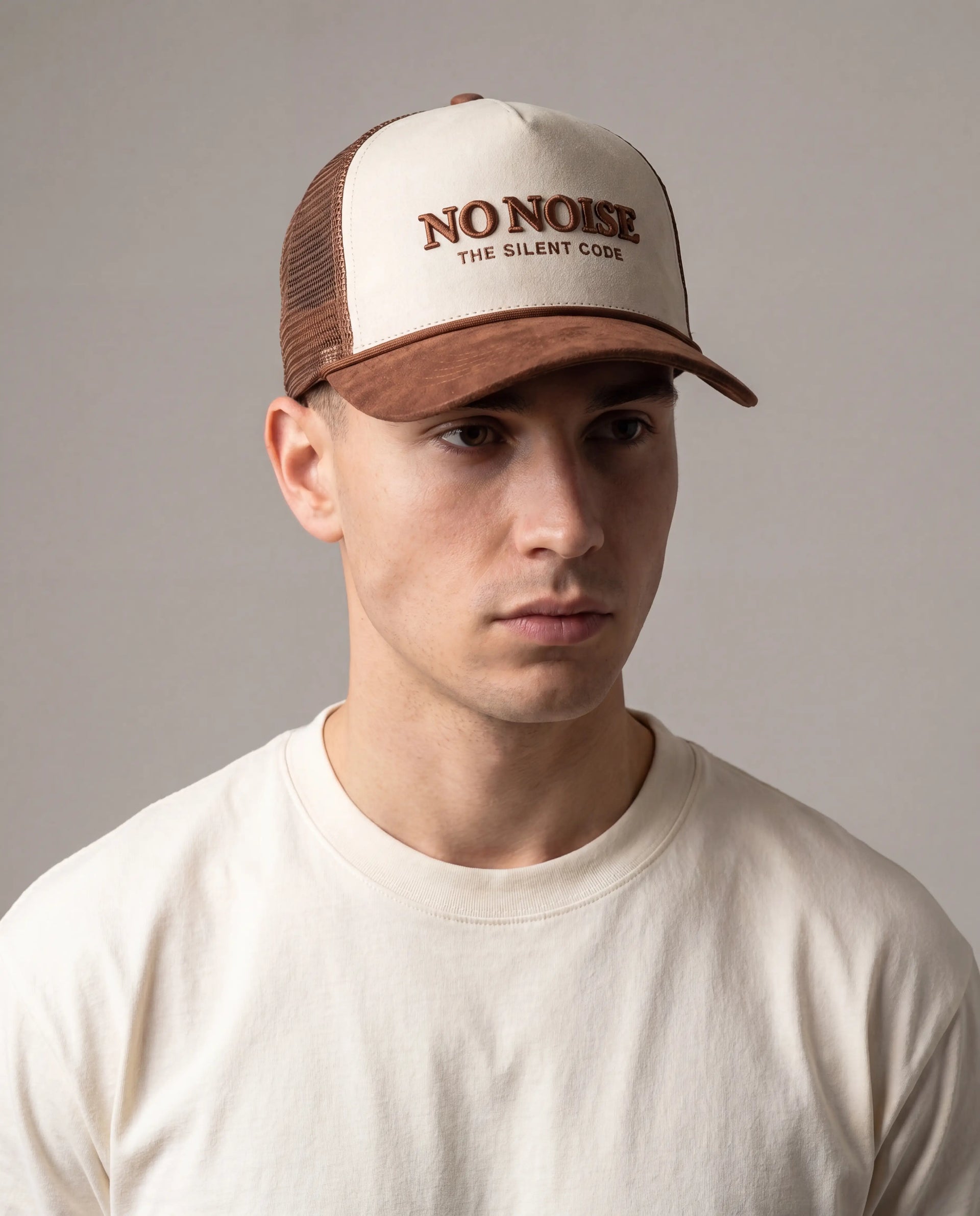 NO NOISE Desert Code hat on model, front view