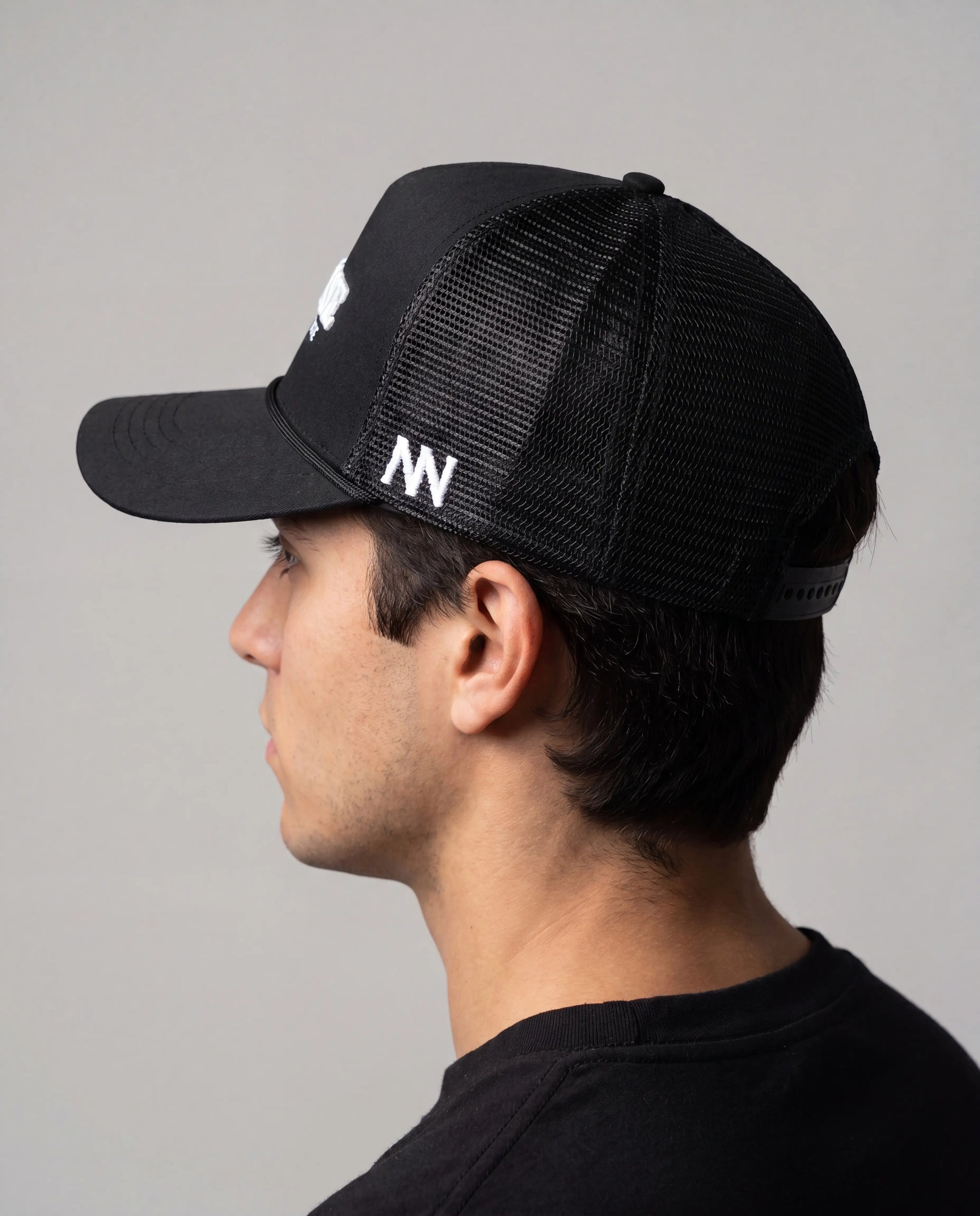 NO NOISE Shadow Code hat on model, side/back view