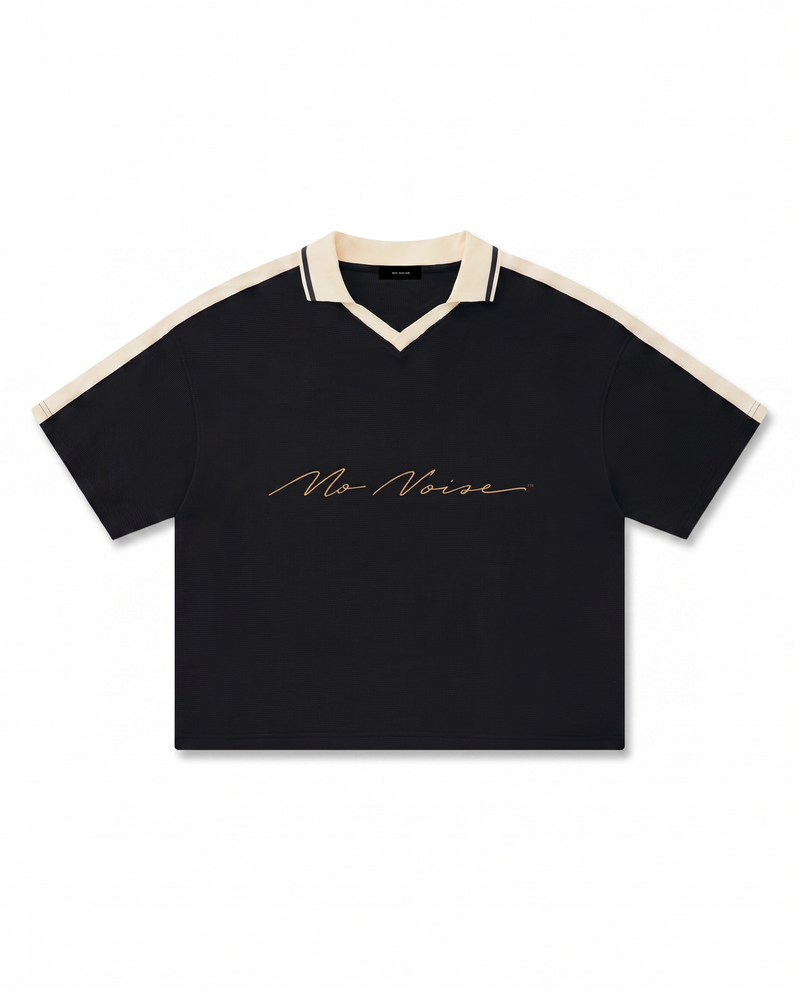 NO NOISE™ CHAPTER 001 PARIS UNISEX COLOR BLOCK POLO SHIRT — BLACK/CREAM — Hero
