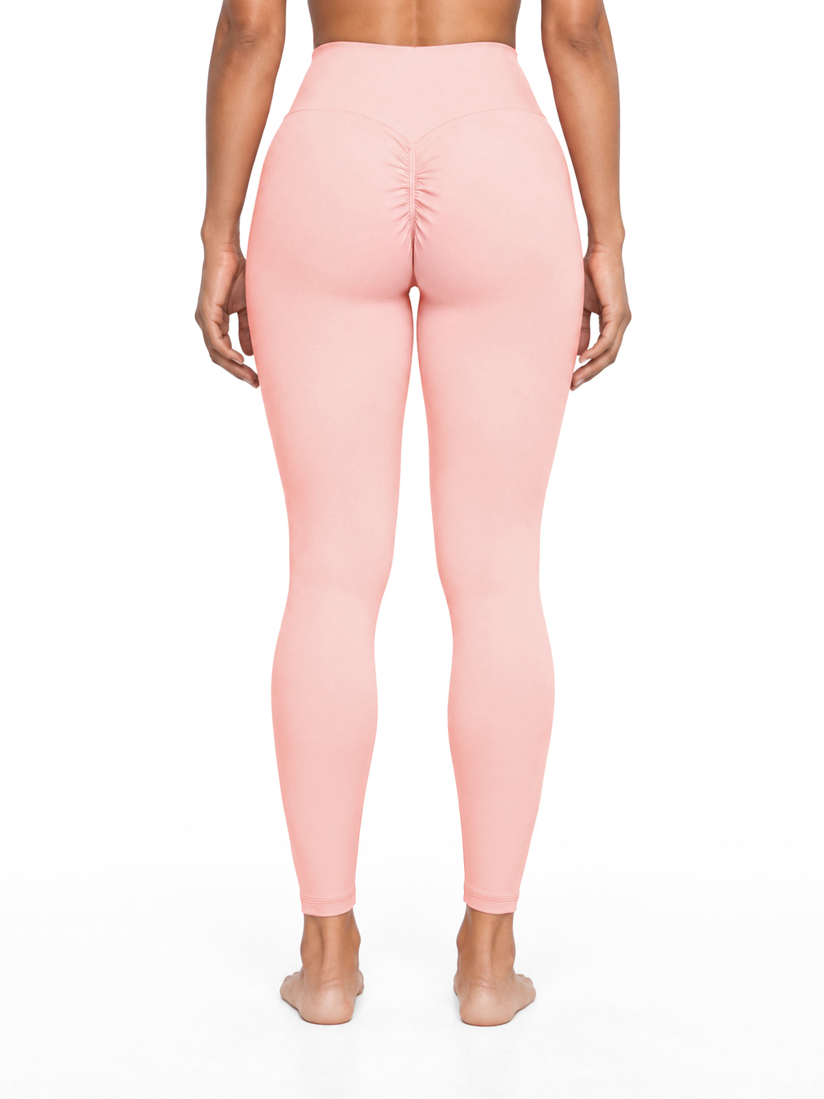 NO NOISE Poise High-Rise Leggings — Petal, pink, back view on a cropped model showing ruched center seam.