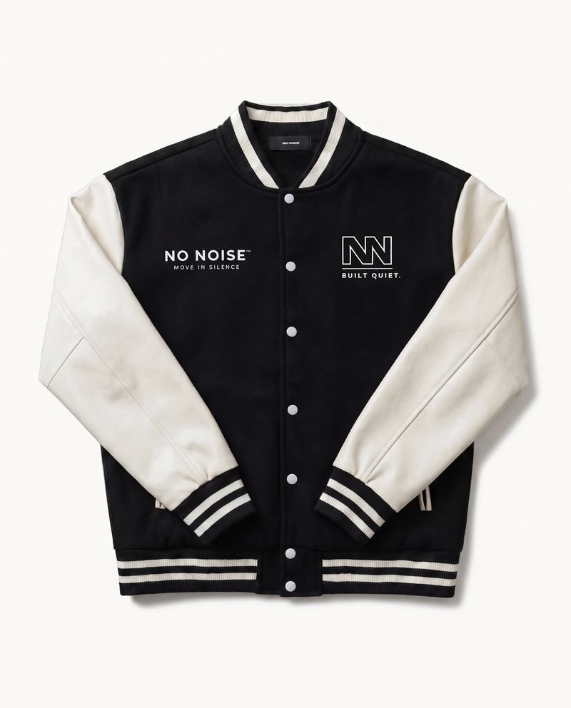 NO NOISE™ CLUB JACKET — BLACK — product view on warm ivory.