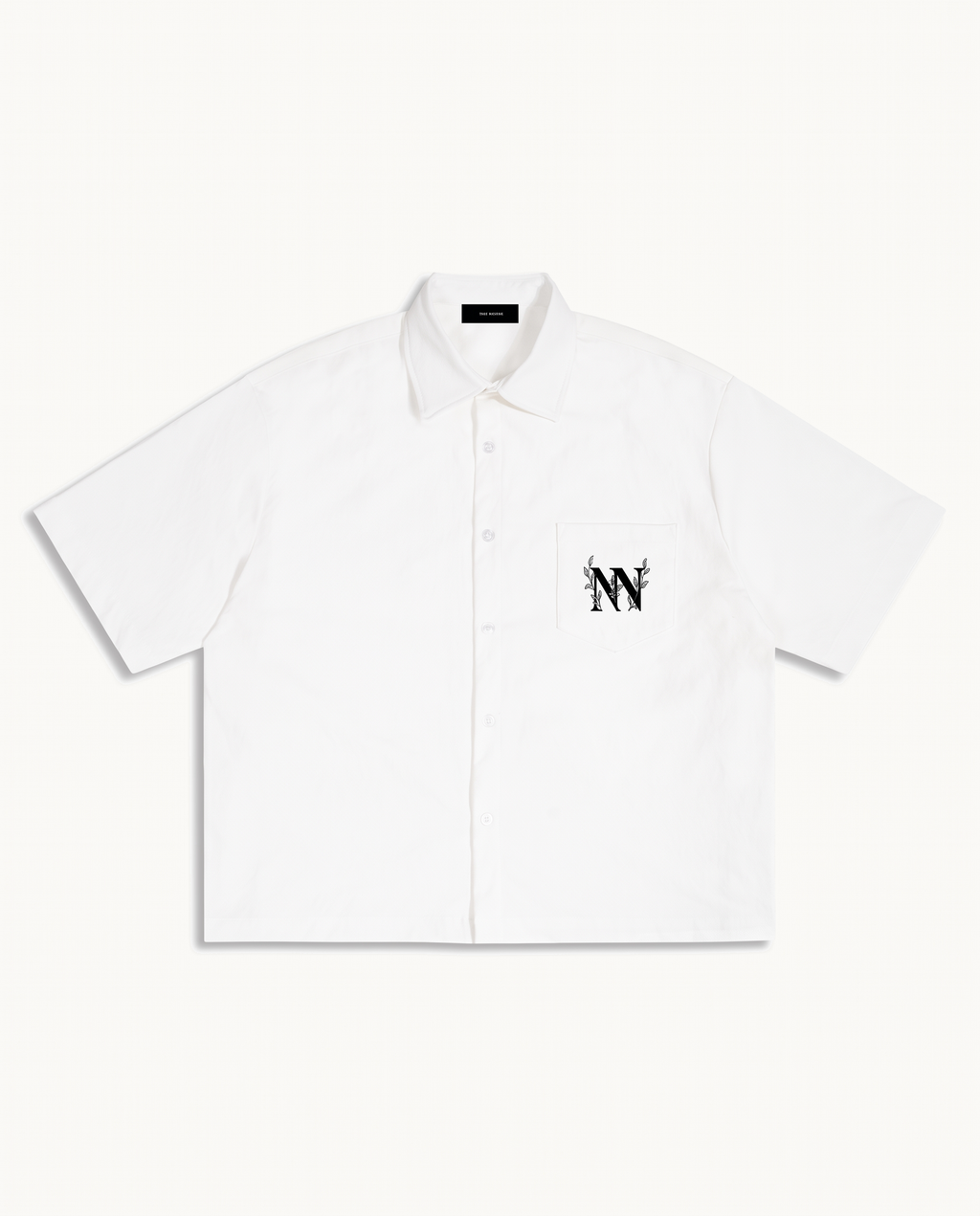 NO NOISE™ 001 BOTANICAL CAMP SHIRT — WHITE — product view on warm ivory.