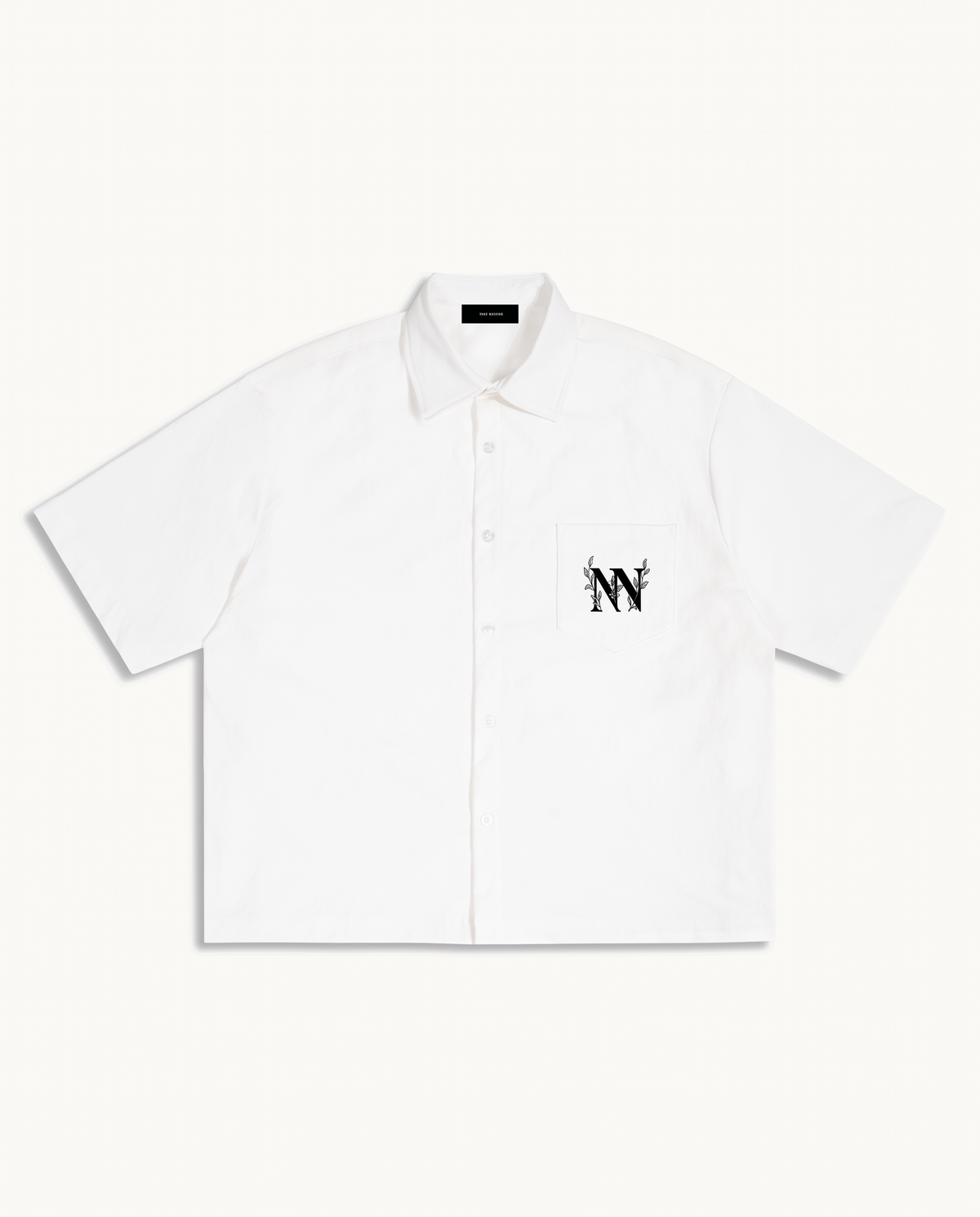 NO NOISE™ 001 BOTANICAL CAMP SHIRT — WHITE — product view on warm ivory.