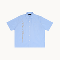 NO NOISE™ THE QUIET SIGNATURE STRIPE SHIRT — POWDER BLUE — product view on warm ivory.