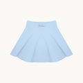 THE COURT SKIRT — BLUE — product view on warm ivory.