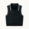 THE COURT POLO — BLACK — product view on warm ivory.