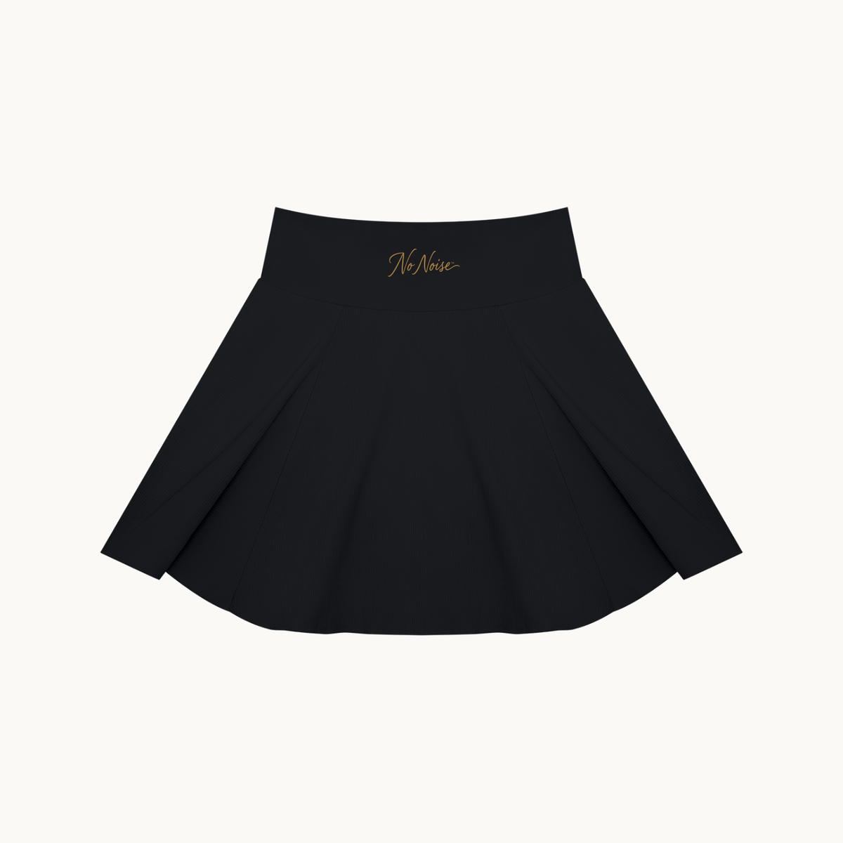 THE COURT SKIRT — BLACK — product view on warm ivory.