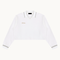 THE QUIET POLO — IVORY — product view on warm ivory.