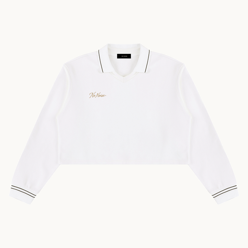 THE QUIET POLO — IVORY — product view on warm ivory.