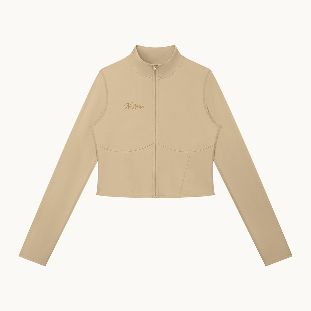 THE QUIET ZIP JACKET — SAND — product view on warm ivory.