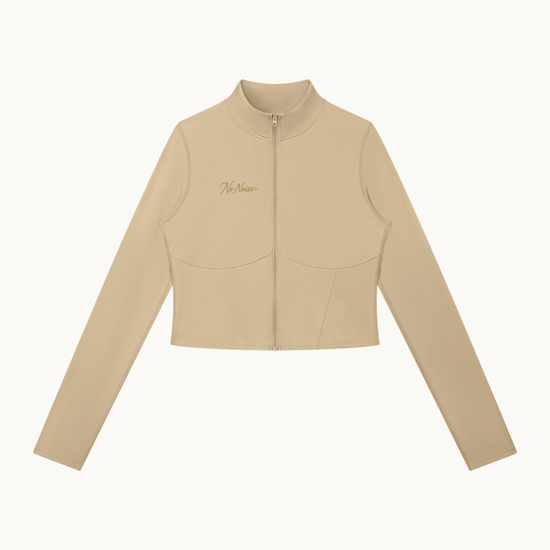 THE QUIET ZIP JACKET — SAND — product view on warm ivory.