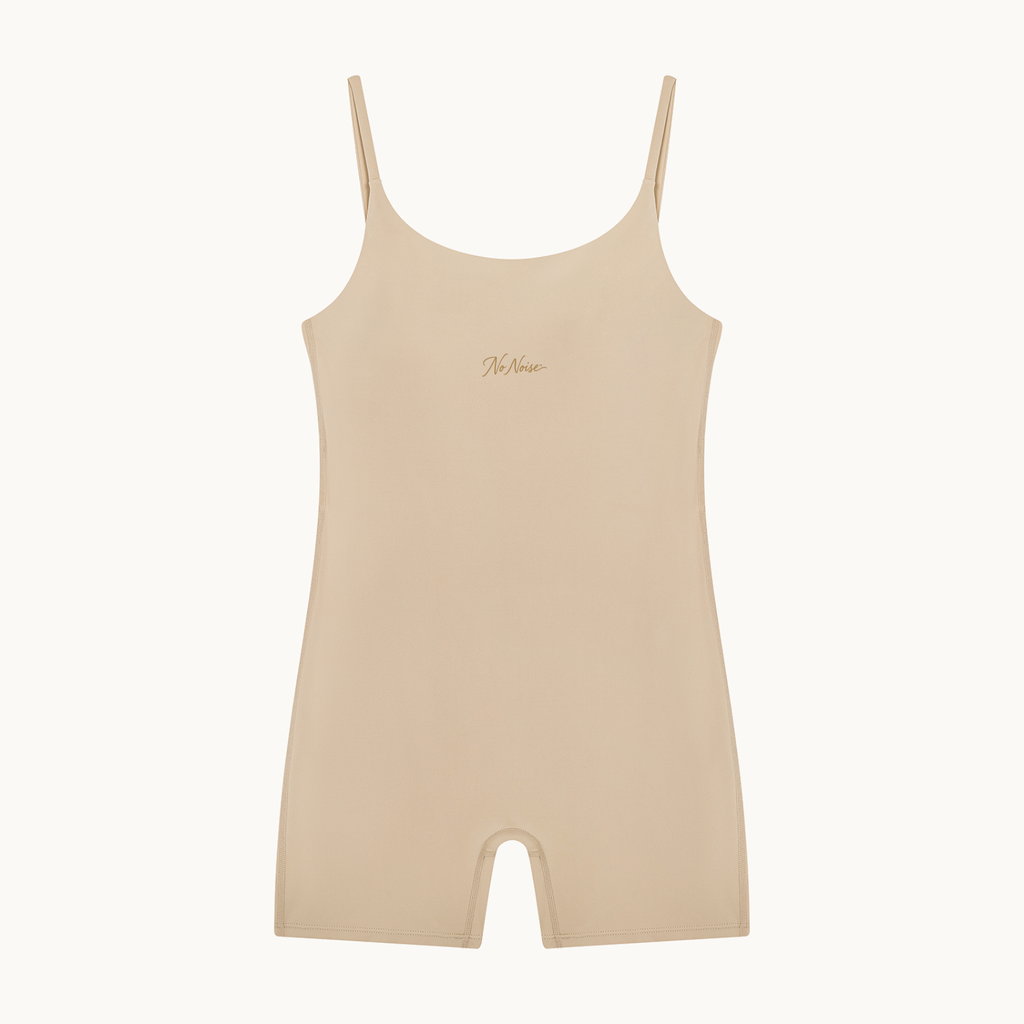 THE QUIET SUIT — CREAM — product view on warm ivory.