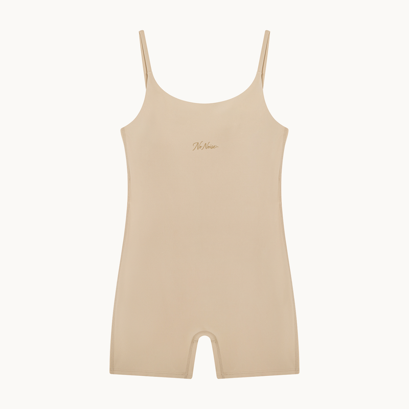 THE QUIET SUIT — CREAM — product view on warm ivory.