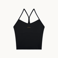 MOTION SPORTS BRA — product view on warm ivory.