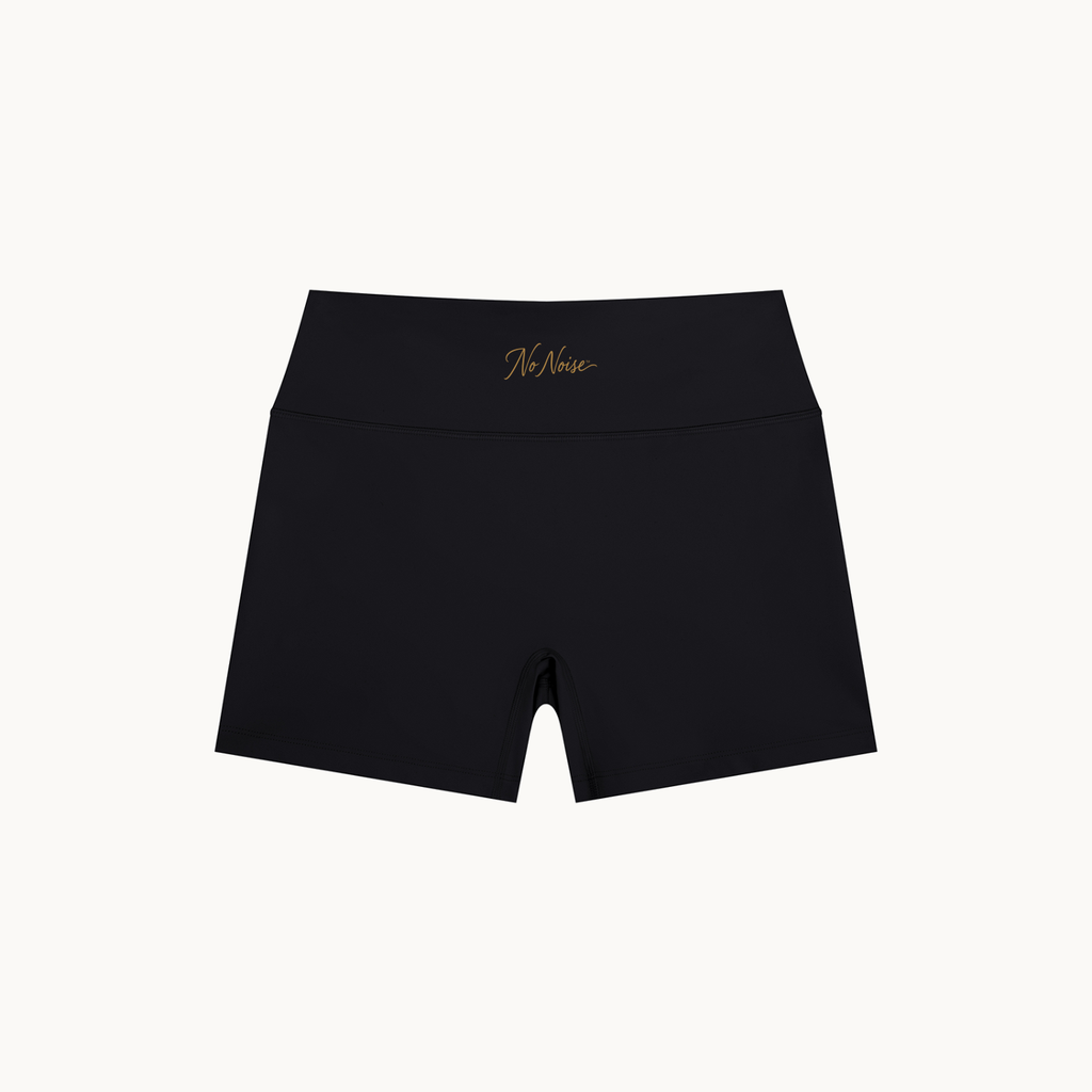 MOTION HIGH RISE SHORTS — product view on warm ivory.