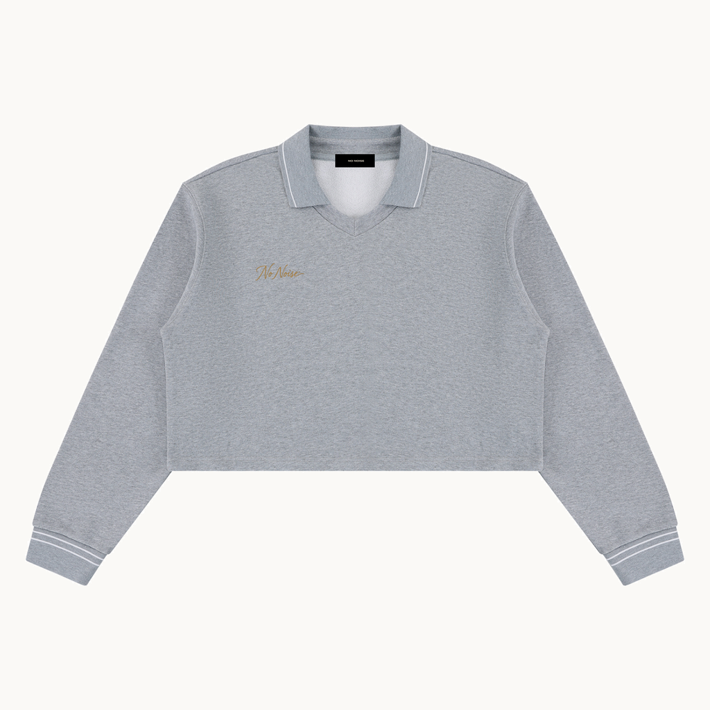 THE QUIET POLO — HEATHER — product view on warm ivory.
