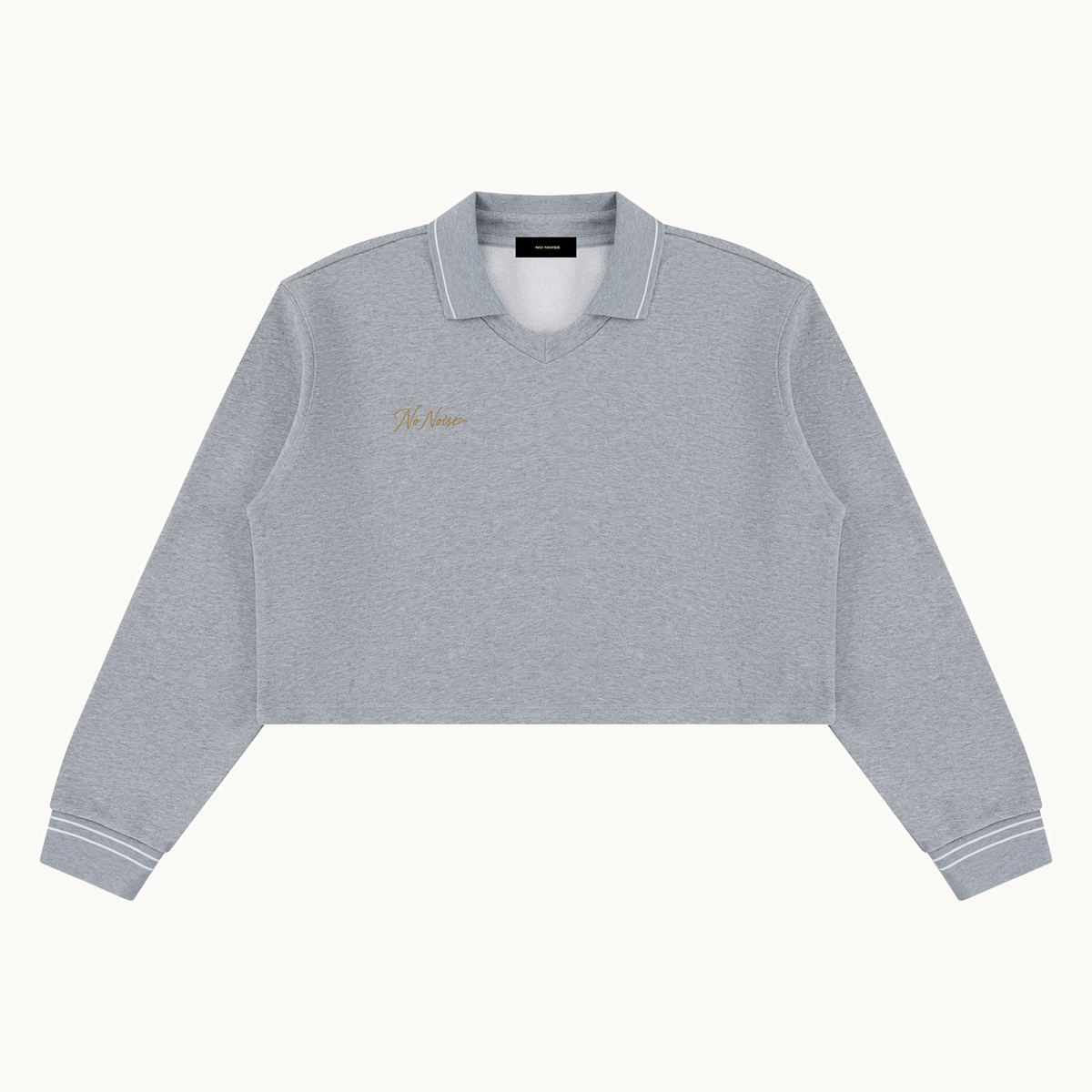 THE QUIET POLO — HEATHER — product view on warm ivory.