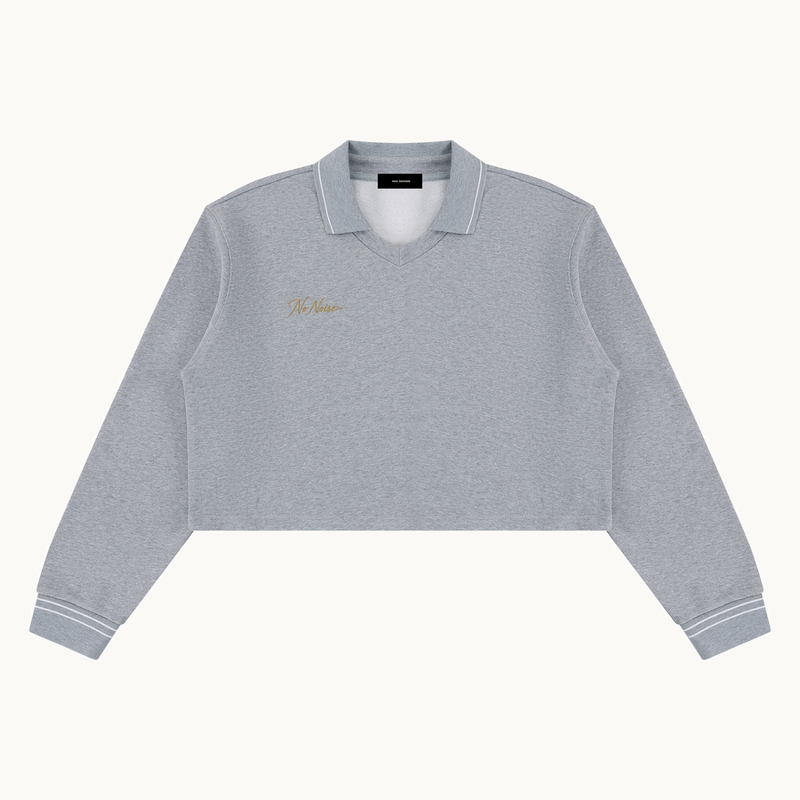 THE QUIET POLO — HEATHER — product view on warm ivory.