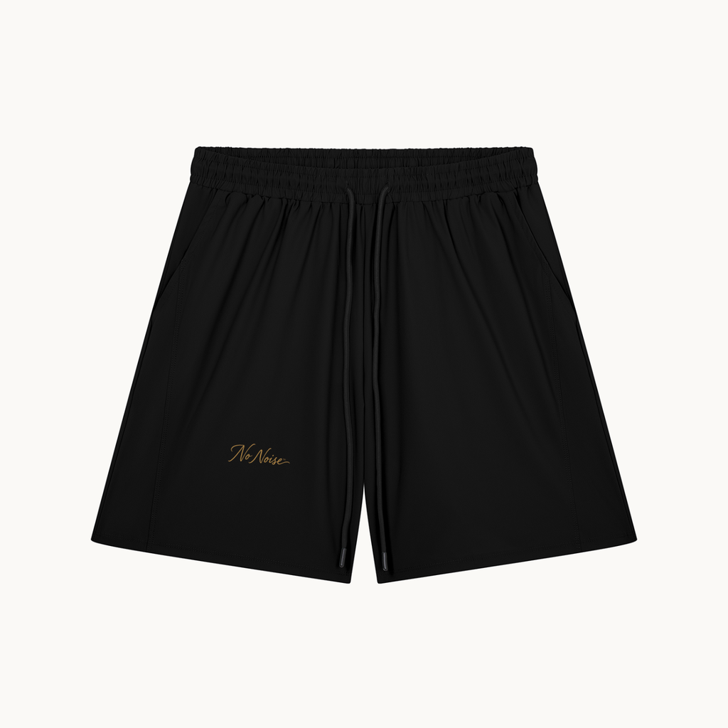 ESSENTIAL SHORT — product view on warm ivory.