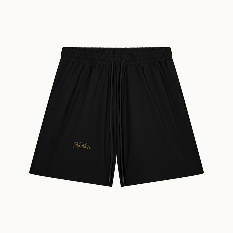 ESSENTIAL SHORT — product view on warm ivory.