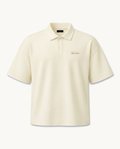 THE SIGNATURE DROP SHOULDER POLO — IVORY — product view on warm ivory.