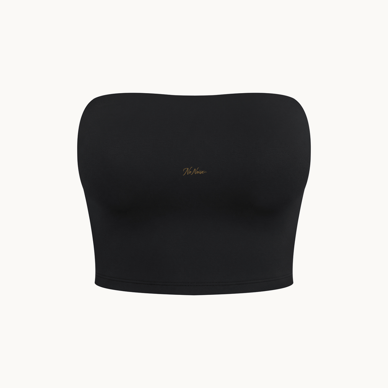 STUDIO TUBE TOP™ — BLACK — product view on warm ivory.