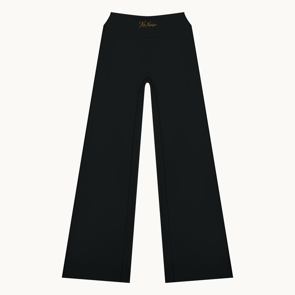 STUDIO HIGH RISE FLARE PANT™ — BLACK — product view on warm ivory.