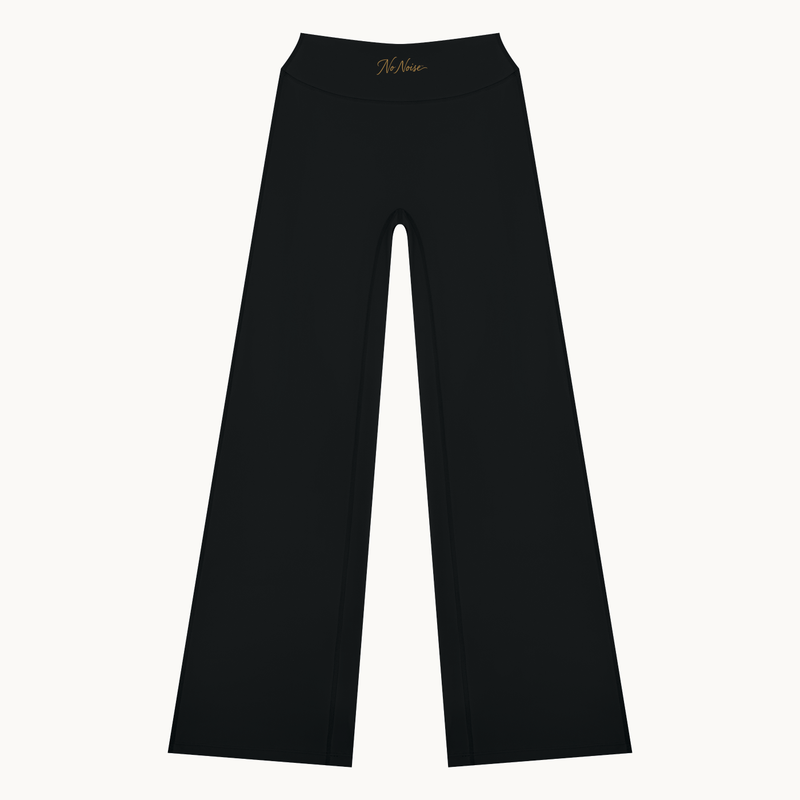 STUDIO HIGH RISE FLARE PANT™ — BLACK — product view on warm ivory.