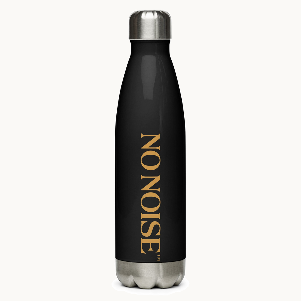 NO NOISE™ SILENT CARRY BOTTLE — 17 OZ SLIM BLACK — product view on warm ivory.