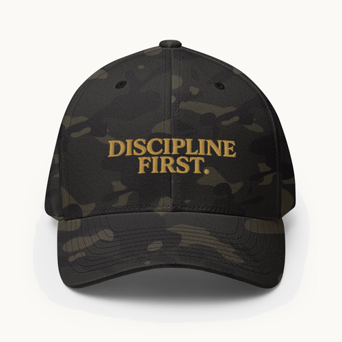 NO NOISE™ DISCIPLINE FIRST MULTICAM CAP — BLACK — product view on warm ivory.