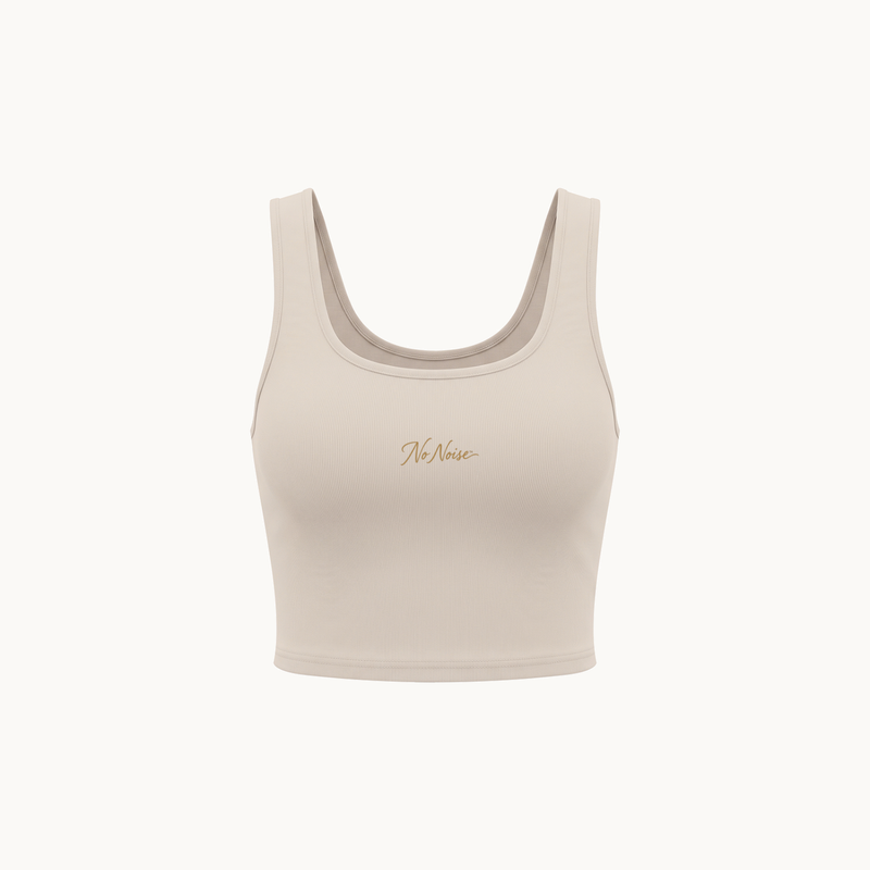 NO NOISE™ HER CUTOUT CROP TOP — MILD APRICOT — product view on warm ivory.