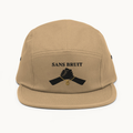NO NOISE™ SILENT PACT FIVE-PANEL CAP — SANDSTONE — product view on warm ivory.